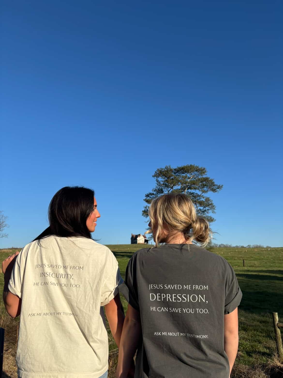 Lydia and friend wearing testimony t-shirts - 'Jesus Saved Me From Insecurity' and 'Jesus Saved Me From Depression'
